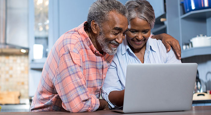Couple with laptop